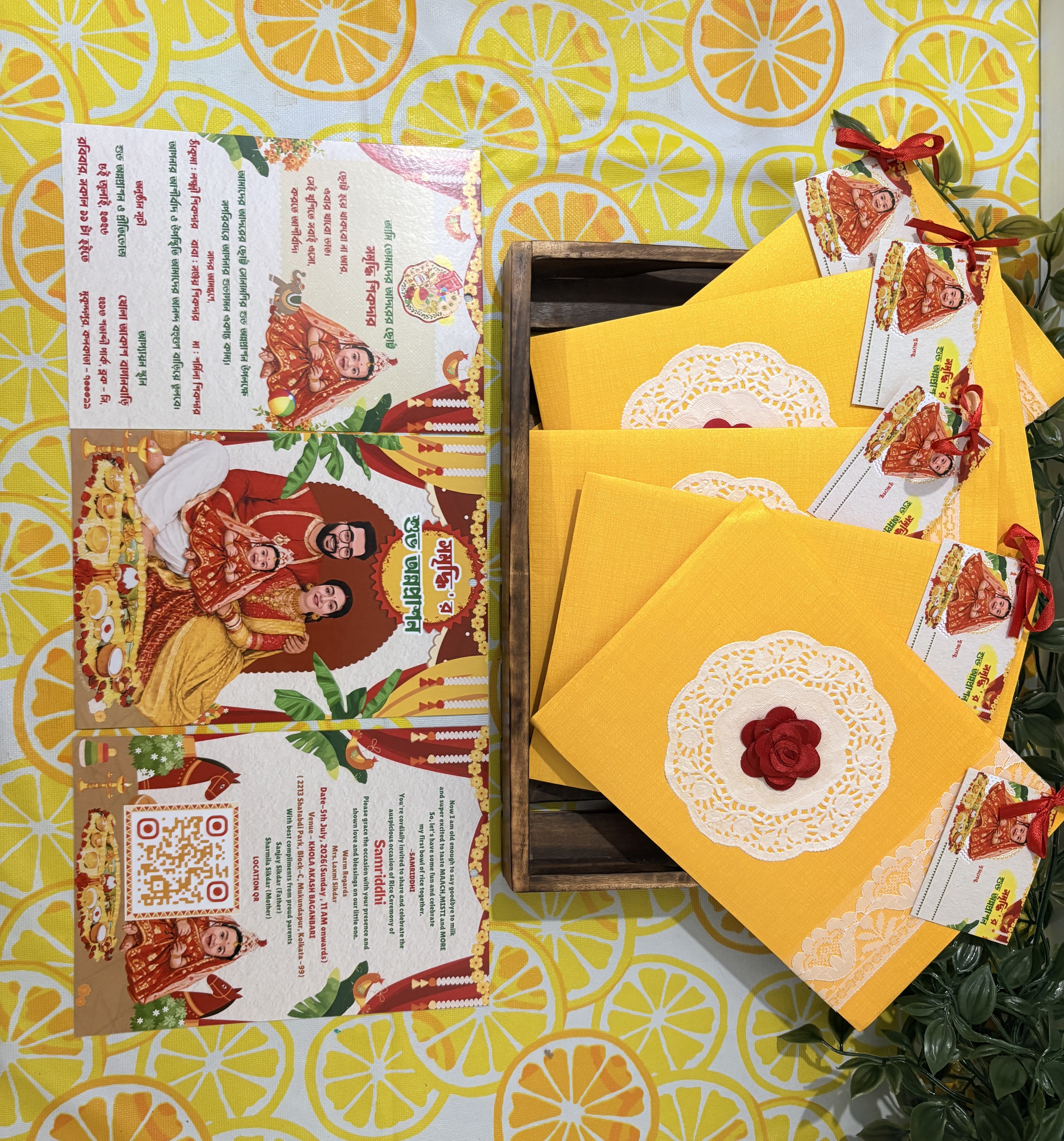 Multiple physical invitation cards and envelopes with personalised name tags